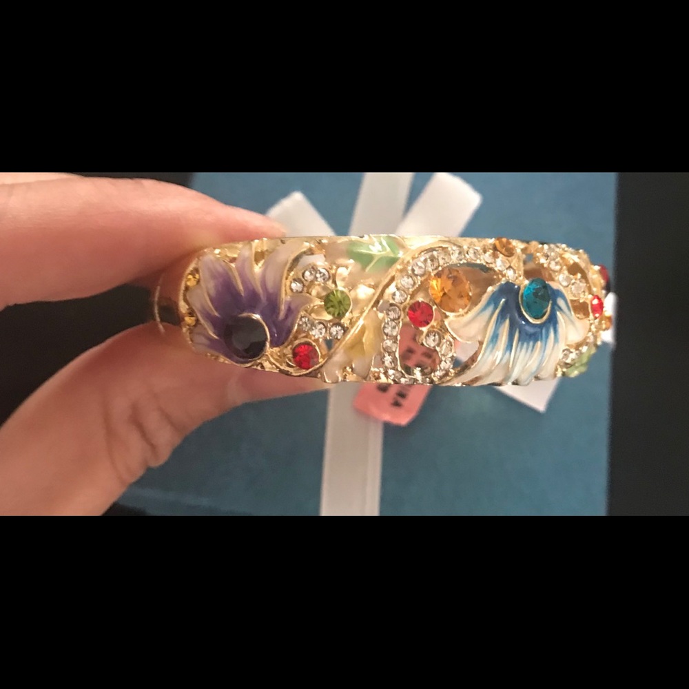 Set of vintage earrings and bangle.